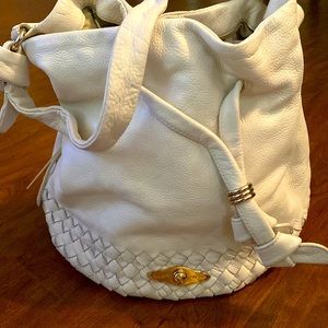 Beautiful soft leather bucket shoulder bag with gold embellishments
